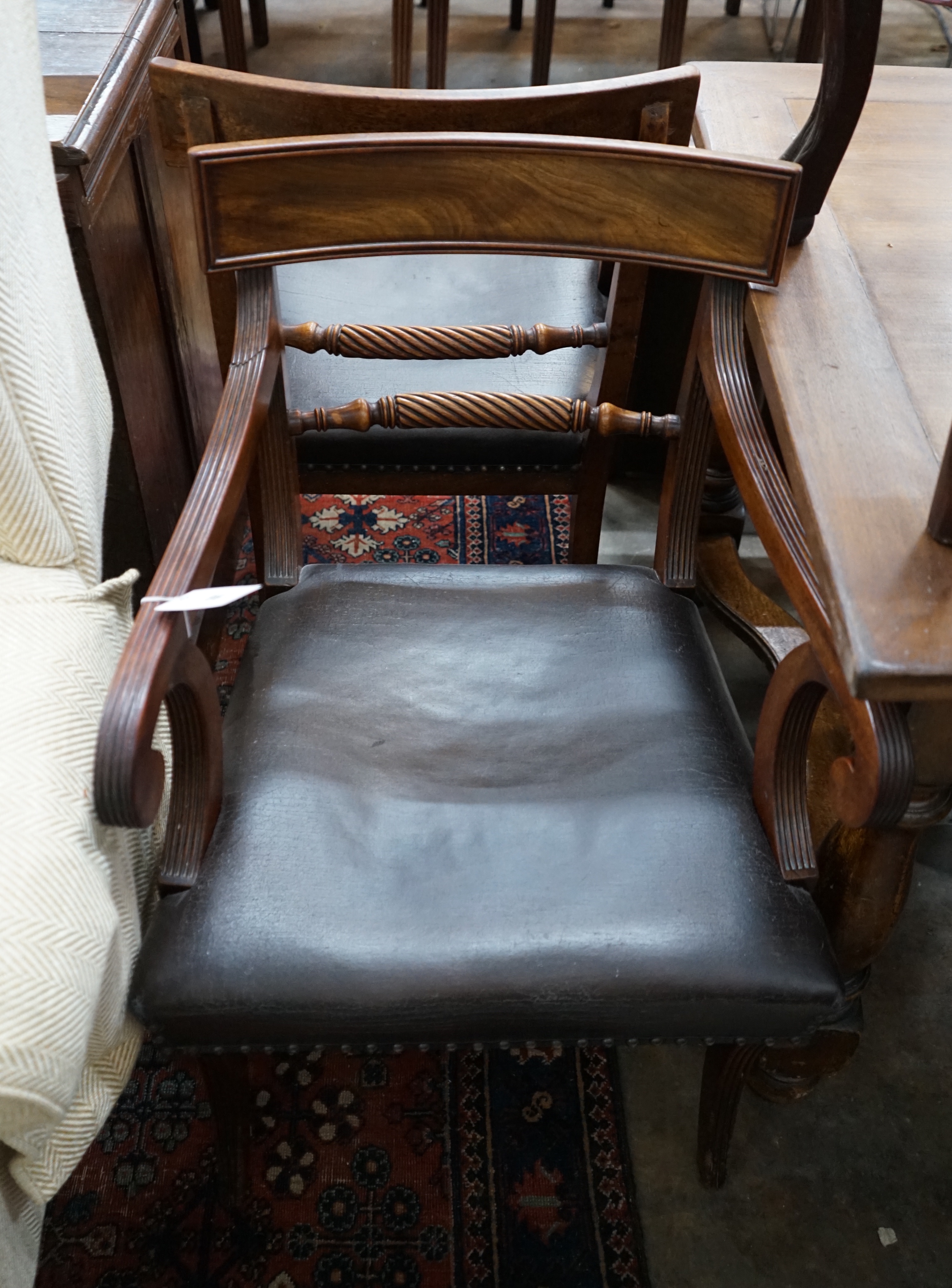 A set of eight Regency mahogany dining chairs, two with arms